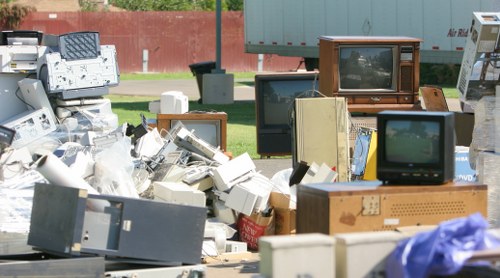 Recycling center handling large appliances